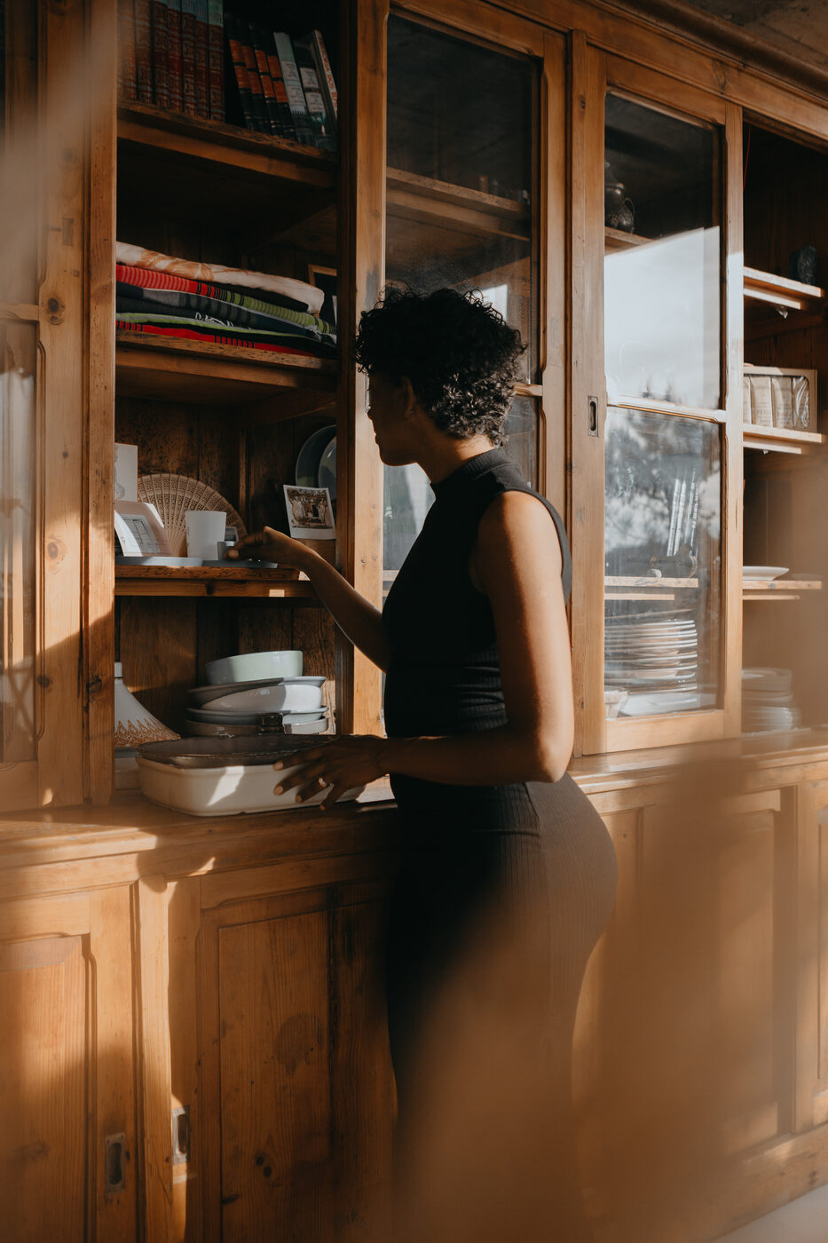 Telma in a warm, sunlit kitchen